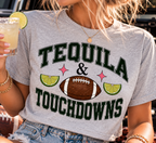 Close-up of the Tequila & Touchdowns crop tee showing the football graphic