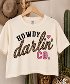 Howdy Darlin’ crop tee in Vintage White displayed on a wooden hanger
