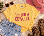 Tequila Cowgirl boxy tee styled in a Western-inspired flat lay with denim