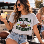 Woman wearing the Tequila & Touchdowns crop tee with denim shorts and sunglasses